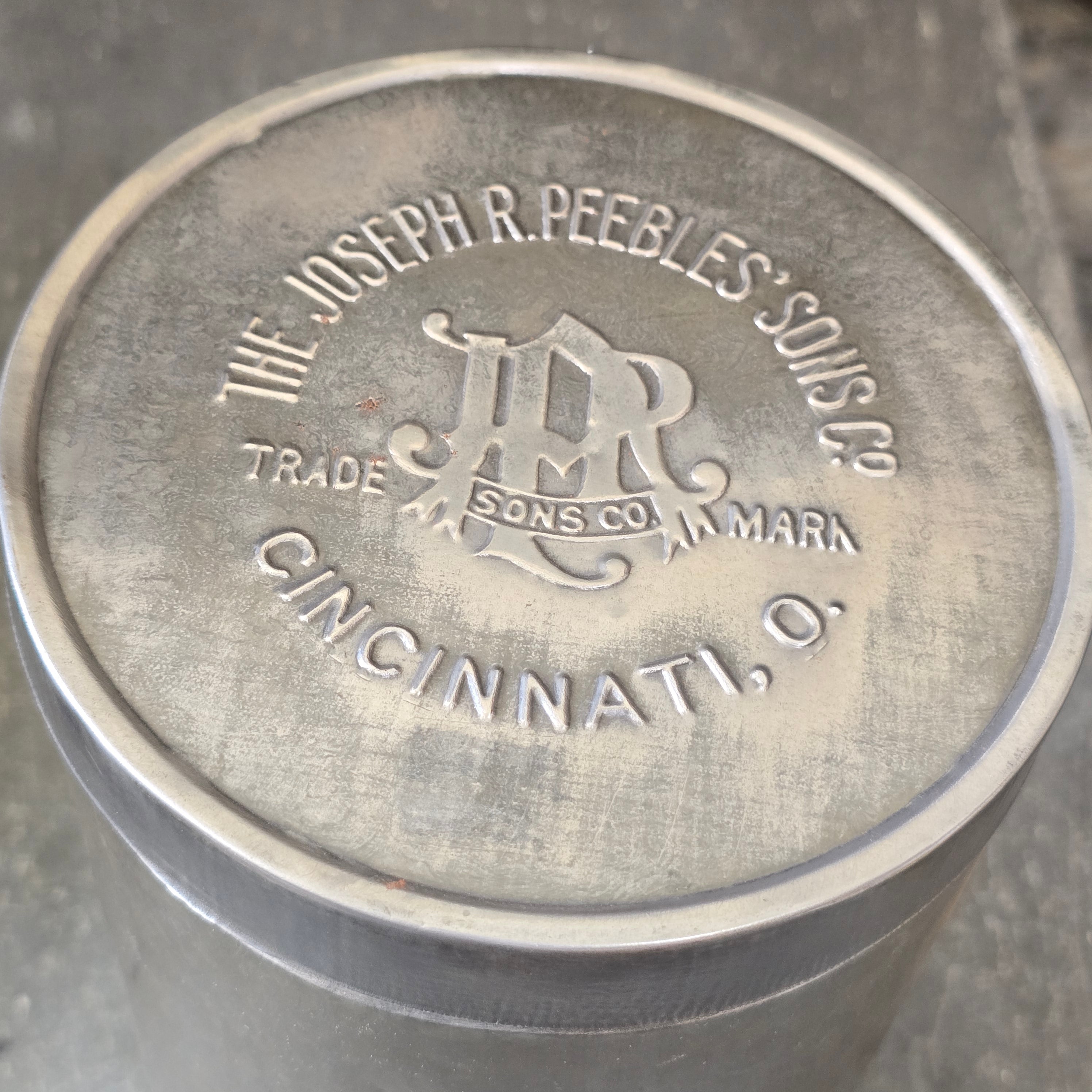 Joseph R. Peebles' Sons Co. Cincinnati, OH Embossed Advertising Tin Canister